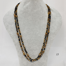 Load image into Gallery viewer, Long Strand Beads with Animal Print Accent
